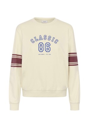 Cremefarbenes Sweatshirt mit blauer "CLASSIC" und "86" Schrift, ergänzt durch kastanienbraune Streifenakzente an den Ärmeln sowie gerippten Bündchen und Saum.