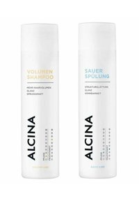 Weiße Flaschen für Shampoo und Spülung mit schwarzem Text. Shampoo mit der Bezeichnung "Volumen" in Gold, Spülung "Sauer Spülung" in Blau.