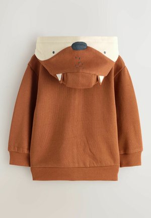 Brown sweatshirt featuring a hood designed as a bear's face, with white accents, teeth, and a textured finish. Ribbed cuffs and hem.