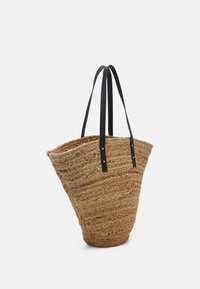 Woven straw tote bag with a conical shape, featuring two black synthetic leather straps and gold-tone hardware accents. Textured surface.