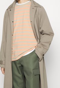 NN.07 Maglione - orange