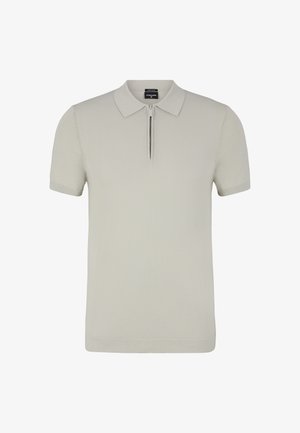 Kurzärmeliges Polohemd in Hellgrau. Mit Reißverschluss am Kragen und gerippten Bündchen. Hergestellt aus weichem, strukturiertem Stoff. Klare Linienführung.