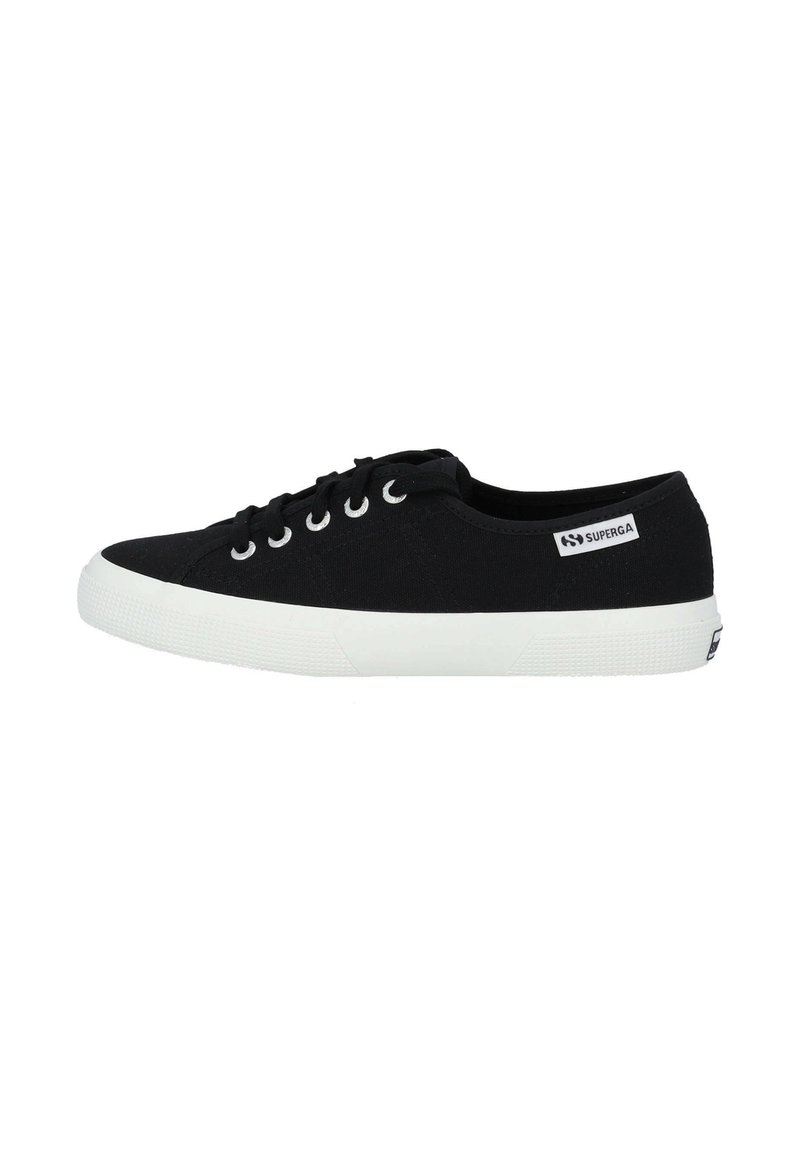 Black canvas sneaker with white rubber sole, round toe, and lace-up design. Brand label on side displays "SUPERGA." Minimalist style.