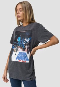 Grijze katoenen t-shirt met een kleurrijke "Star Wars" grafische print op de voorkant, korte mouwen en een ontspannen pasvorm met een klein logo label.