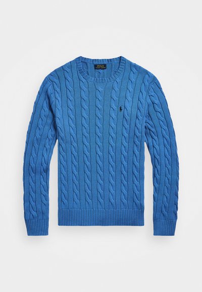 Blue knitted sweater with a cable design, round neckline, and ribbed cuffs. Features a small logo on the left chest. Soft texture.