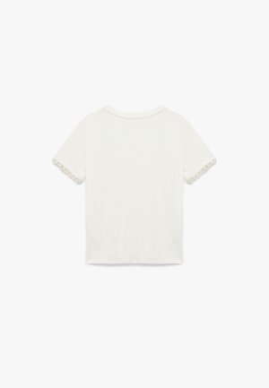 Weißes T-Shirt mit kurzen Ärmeln und Spitzenakzenten an den Ärmeln. Weicher Stoff, runder Ausschnitt und lockere Passform.