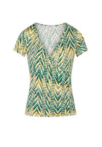 Wrap-stil topp i grönt, gult och vitt zigzagmönster. Kortsleeves, djup V-halsringning och textil med subtilt rynk på sidan.