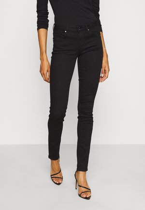 Black skinny jeans featuring a mid-rise waist, classic five-pocket design, and subtle metal hardware. Smooth texture, slim fit.