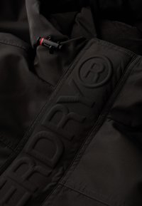 Superdry & Co Outdoorová bunda - black