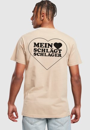 T-shirt con stampa - sand