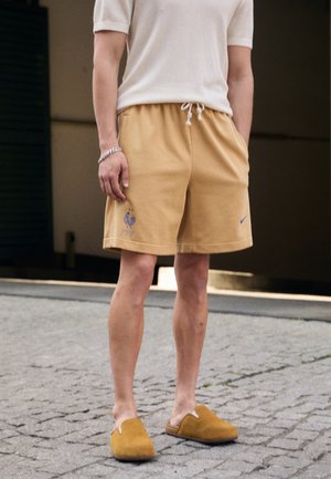 Pantalón corto de deporte - gold-coloured