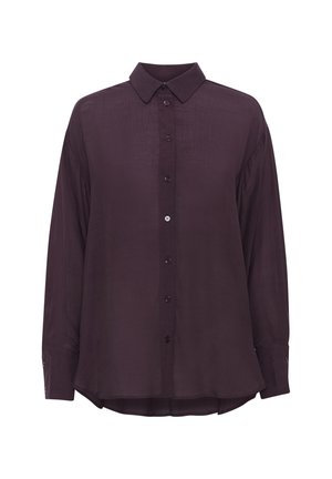 Long-sleeve, deep purple button-up shirt with a pointed collar, featuring a textured fabric and slightly curved hemline. Buttons are matching in color.