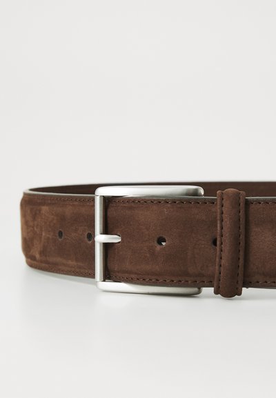 Brown suede belt with a smooth silver metal buckle, featuring stitching detail and multiple adjustment holes along the length.