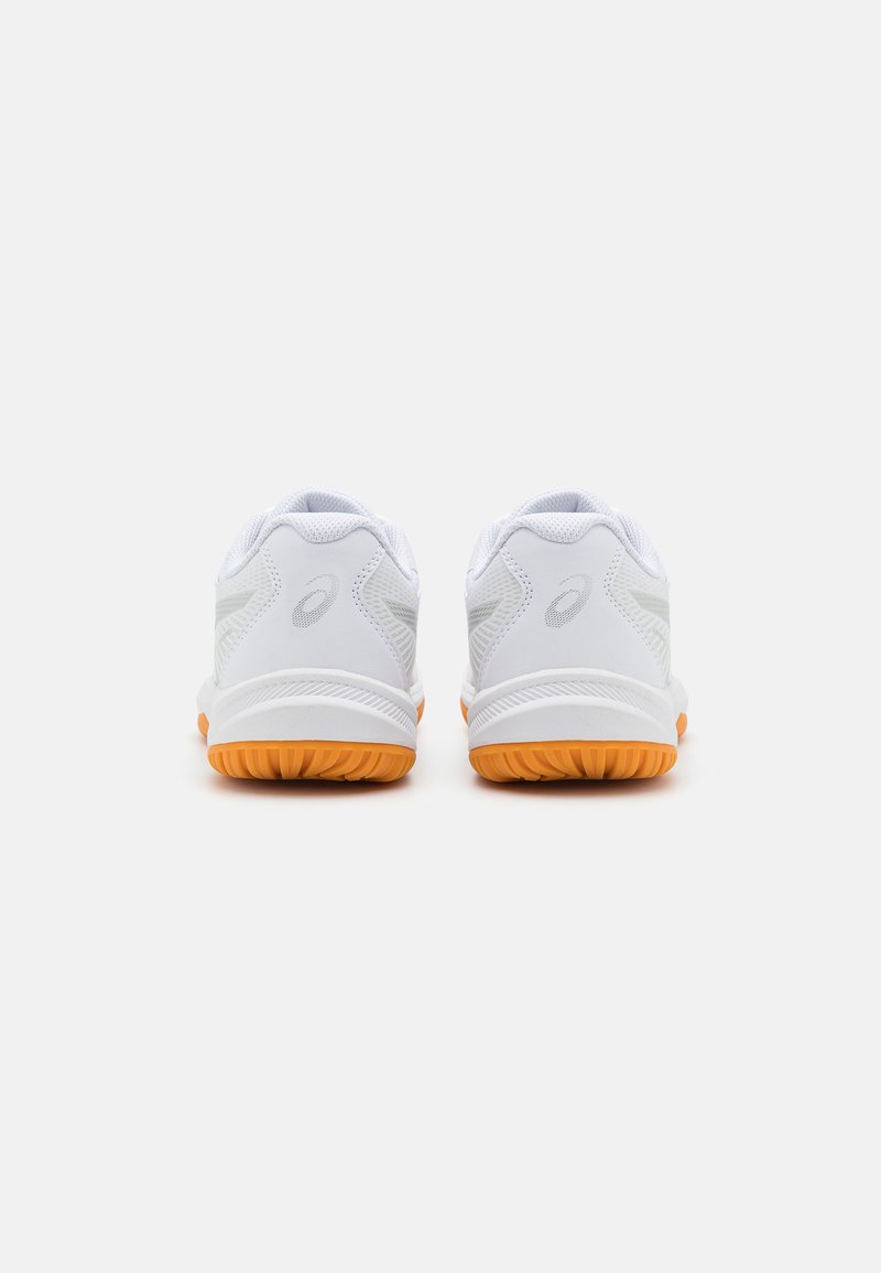 White athletic shoes with an orange rubber sole, featuring a mesh and synthetic upper with subtle gray accents and a padded collar.