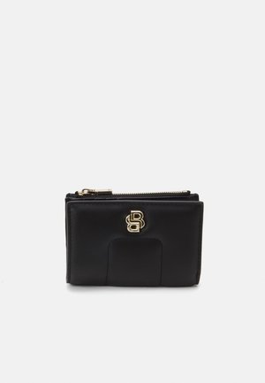 Black leather wallet with zipper closure, featuring a textured surface and a gold logo on the front. Compact rectangular shape.