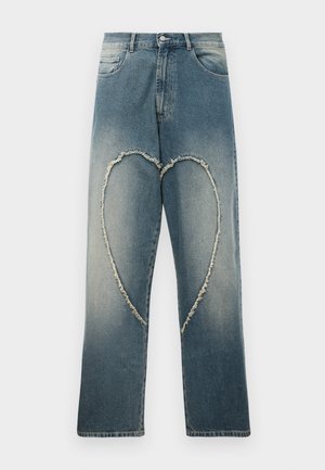 Blue denim jeans with a frayed heart-shaped patch on the front thighs, featuring traditional pockets and a button closure.
