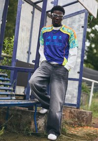 adidas Performance ORLANDO PIRATES X NTS UBP - Jalkapallopaita - mystery ink/unity orange/bluebird/semi solar yellow