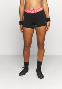 Nike Performance SHORT - Leggings - black/archaeo pink/white