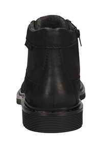 Schwarze Knöchelstiefel mit einer glatten Lederaußenfläche, einem Reißverschluss und einer strukturierten Sohle. Verfügt über einSoft-Innenfutter für zusätzlichen Komfort.