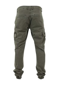 Cargo pants in olijfgroen, gemaakt van katoen. Kenmerken zijn onder andere elastische boorden, meerdere zakken en een relaxte pasvorm.