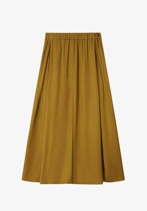 Jupe midi jaune moutarde avec taille élastique et plis souples créant une silhouette fluide.