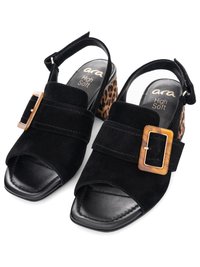 Black suede open-toe sandals with large brown rectangular buckle and leopard print block heel, branded "ara High Soft" on footbed.