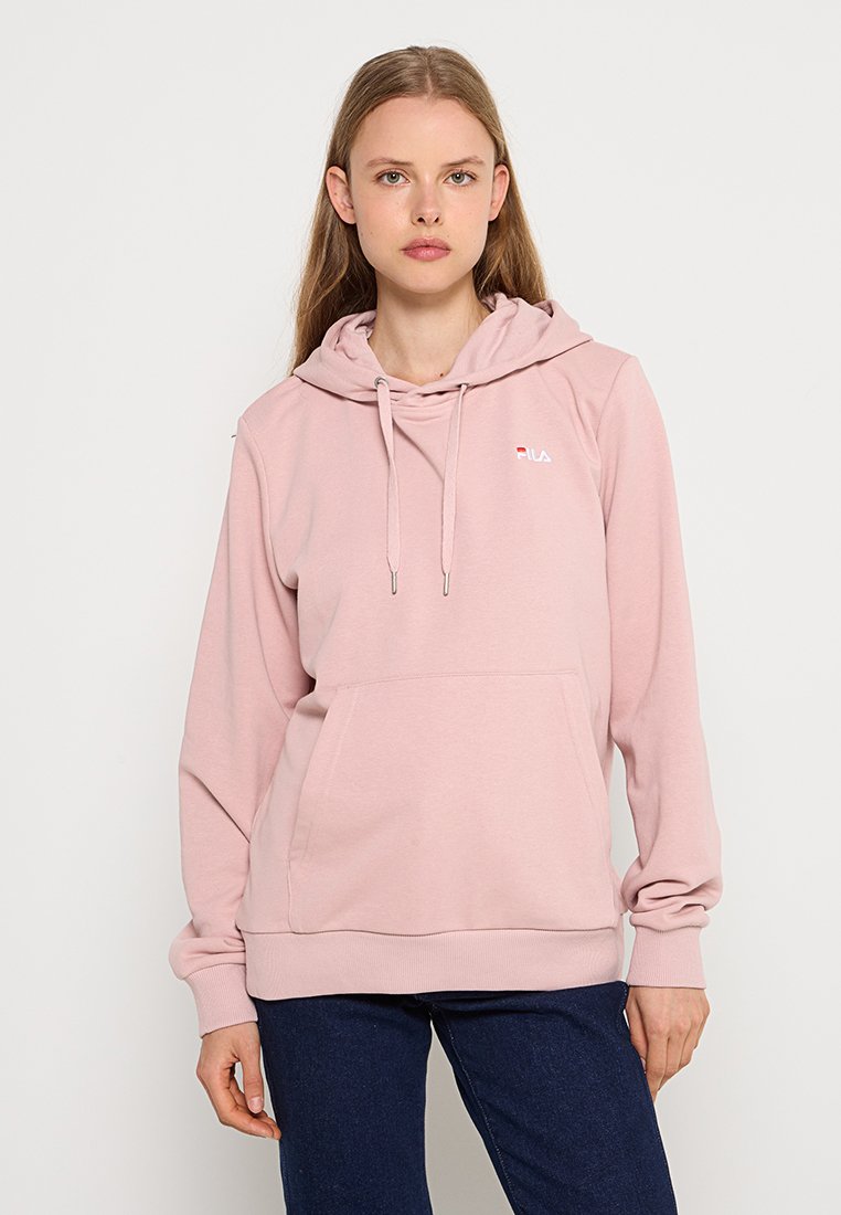 Roze hoodie van zachte stof, met een vo zak, trekkoordkap en klein logo op de borst. Lange mouwen en geribbelde zoom.
