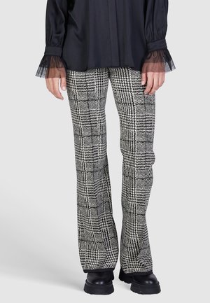 Stoffhose - black varied