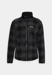 Giacca in pile zip-up a scacchi neri e grigi con colletto alto e una tasca nera liscia. Materiale morbido e texturizzato per il calore.