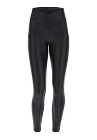 Svart høyt liv leggings laget av glatt, elastisk materiale. Har et kryss-design på midjebåndet og en stram, tilpasset silhuett.