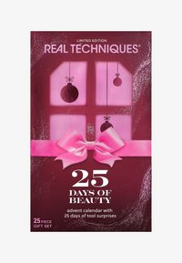 Real Techniques 25 Days of Beauty advent calendar, burgundy with a pink bow, featuring six windows and ornament designs in metallic accents.