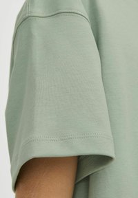 Jack & Jones Junior JJEURBAN EDGE O-NECK NOOS - T-shirt basic - iceberg green