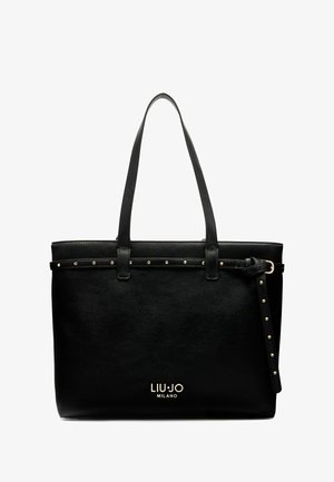 Borsa tote in pelle nera con due manici superiori, borchie dorate lungo il bordo e un logo impresso sul davanti. Texture liscia.