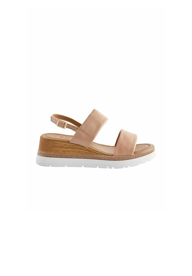 Light pink leather sandal with two wide straps, adjustable ankle buckle, wooden accent, and white rubber sole with textured finish.