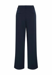 Navyblauwe wijde broek met riemlussen en twee achterzakken, van achteren weergegeven op een witte achtergrond.