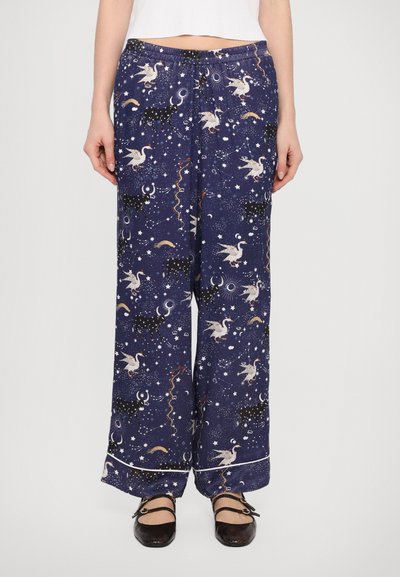 Blå pyjamabukser med et himmelsk mønster med enhjørninger, stjerner og måner; elastisk talje, vid benstil, med en kontrasterende kantdetalje.