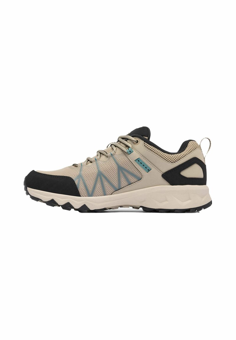 Scarpe da trekking beige con tomaia in rete, accenti neri e dettagli blu. Presentano una suola in gomma testurizzata e una linguetta sul tallone.