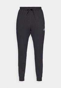 FEELCOZY - Spodnji deli trenirk - black/white