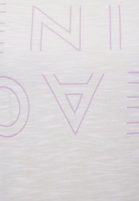 Light-colored fabric featuring a textured surface with purple geometric print, including letters and triangular shapes.