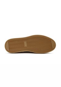 Suela de zapato de goma con un patrón de espiga, de color marrón claro. Acentuada con un área de logo rectangular cerca del talón.