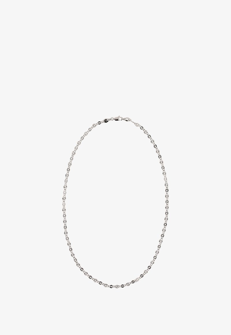 Sølv kædedesign med vekslende cirkulære led og krystalv accents, samt en sikker lukning bagpå.