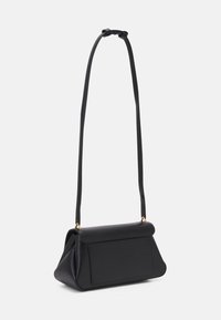 Black leather handbag with a structured design, a flap closure, and a long, adjustable strap. Features gold hardware accents.