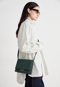 Valitud, palm green