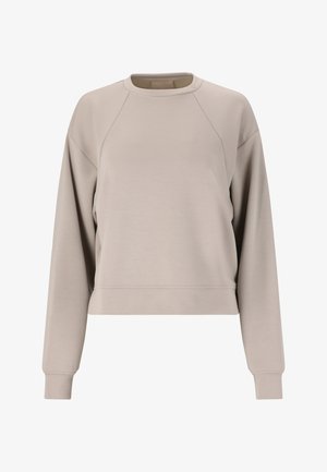 Helles beige, cropped Sweatshirt aus weichem Stoff. Mit Rundhalsausschnitt und langen Raglanärmeln mit gerippten Bündchen.