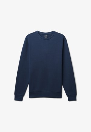 Sweatshirt in cotone blu navy, texture a coste, collo a giro, maniche lunghe e polsini e orlo a coste, con un design minimalista e senza logo visibile.