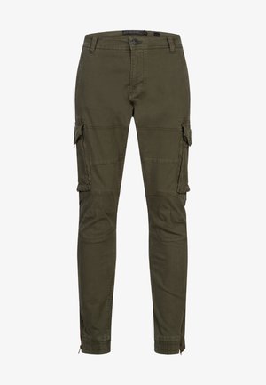 Cargo pants in olive green cotton, featuring side pockets and elastic cuffs, with a smooth texture and tapered design.