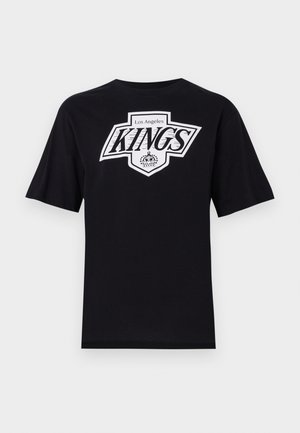 Black cotton t-shirt with short sleeves, featuring "Los Angeles KINGS" logo in white and gray on the front, circular crown graphic below the text.