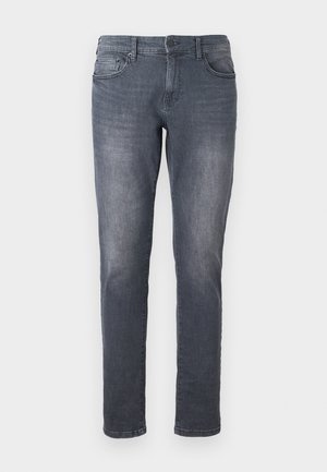 Gray denim jeans with a slim fit, featuring a zip fly, belt loops, front pockets, and a faded wash finish. Standard straight leg design.