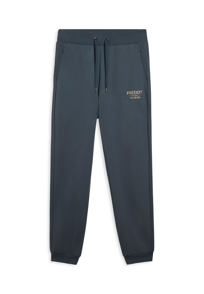Pantaloni della tuta blu navy realizzati in morbido tessuto, dotati di un elastico in vita con cordoncino, tasche laterali e un logo dorato "FREDDY TRAINING".
