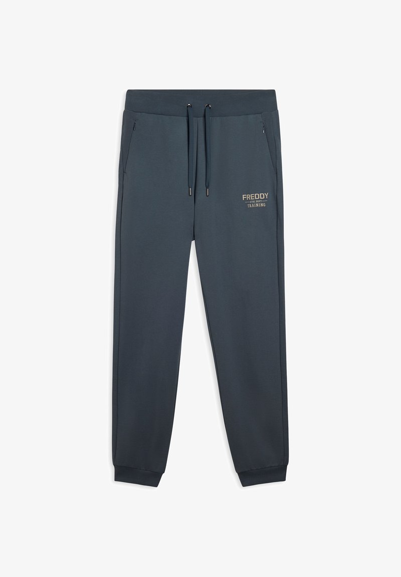 Pantaloni della tuta blu navy realizzati in morbido tessuto, dotati di un elastico in vita con cordoncino, tasche laterali e un logo dorato "FREDDY TRAINING".